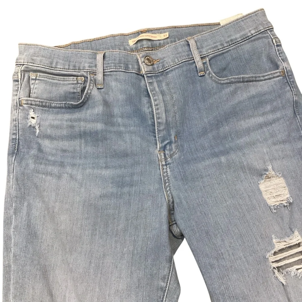 Levi's 720 High Rise Super Skinny Light Wash Distressed Raw Hem Jeans‎ Size 31